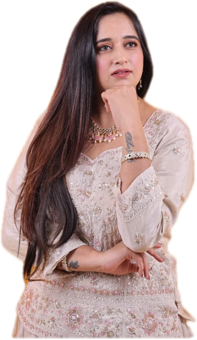 Portrait of Diimple Pancholi in an ivory embroidered outfit
